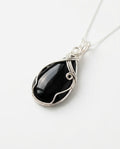 Black Obsidian Crystal Collar Charm – white background luxury